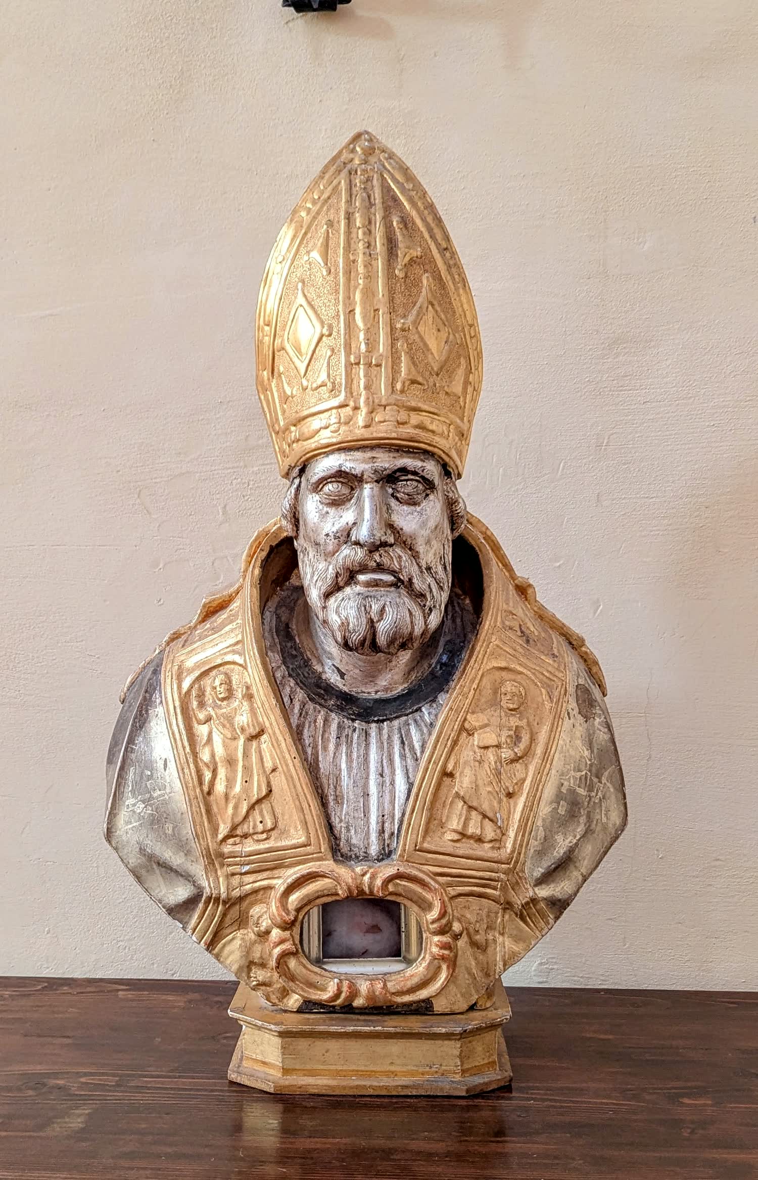 A gilded bishop reliquary inside the abbey