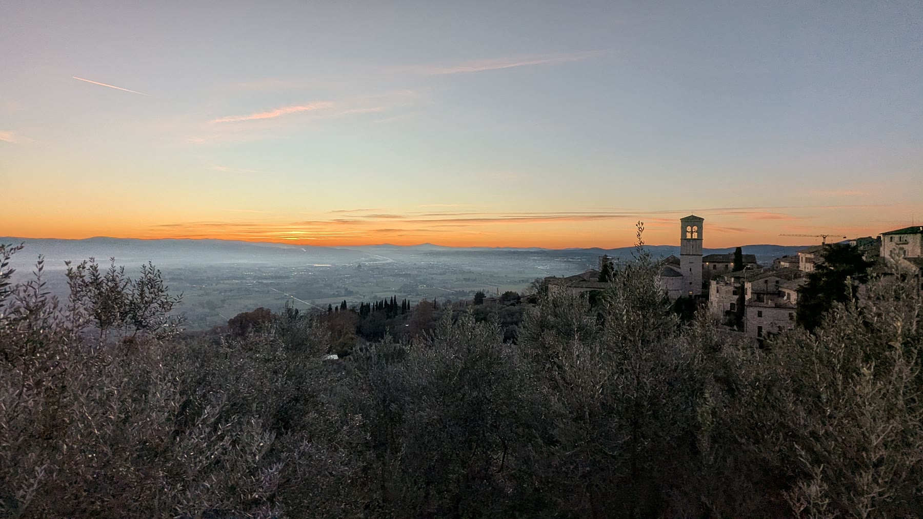 Winter sunset across the Umbrian valley from Assisi